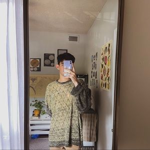 green pullover sweater